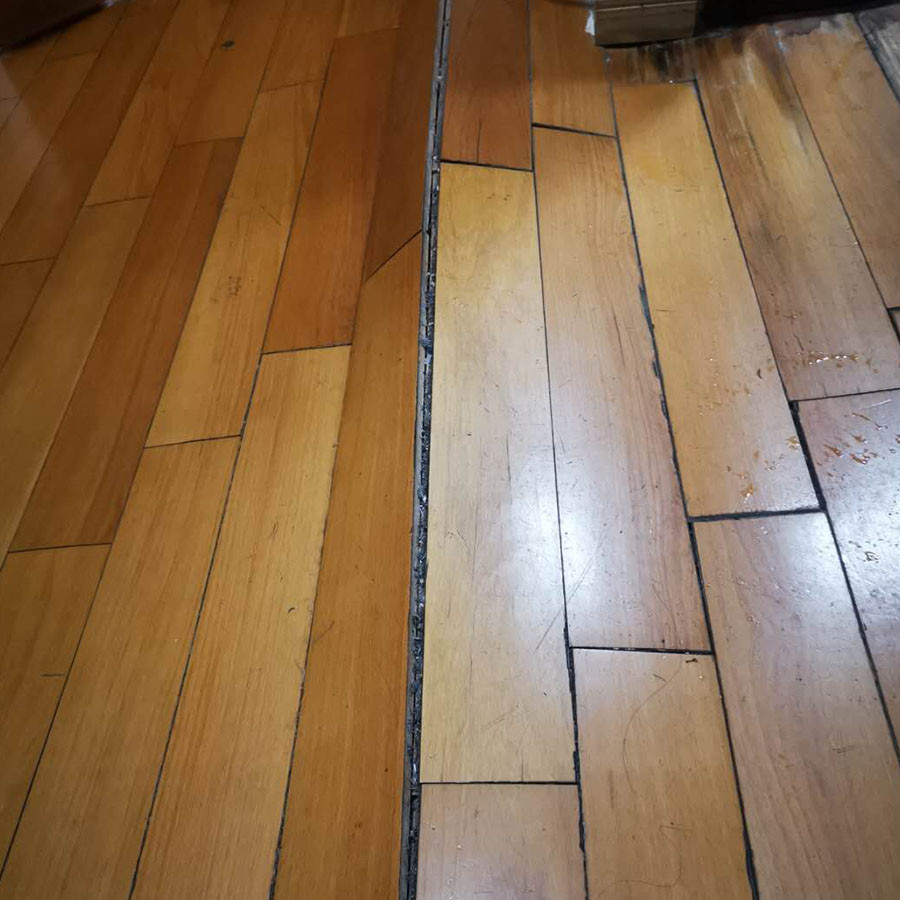 1.木地板拱起问题维修